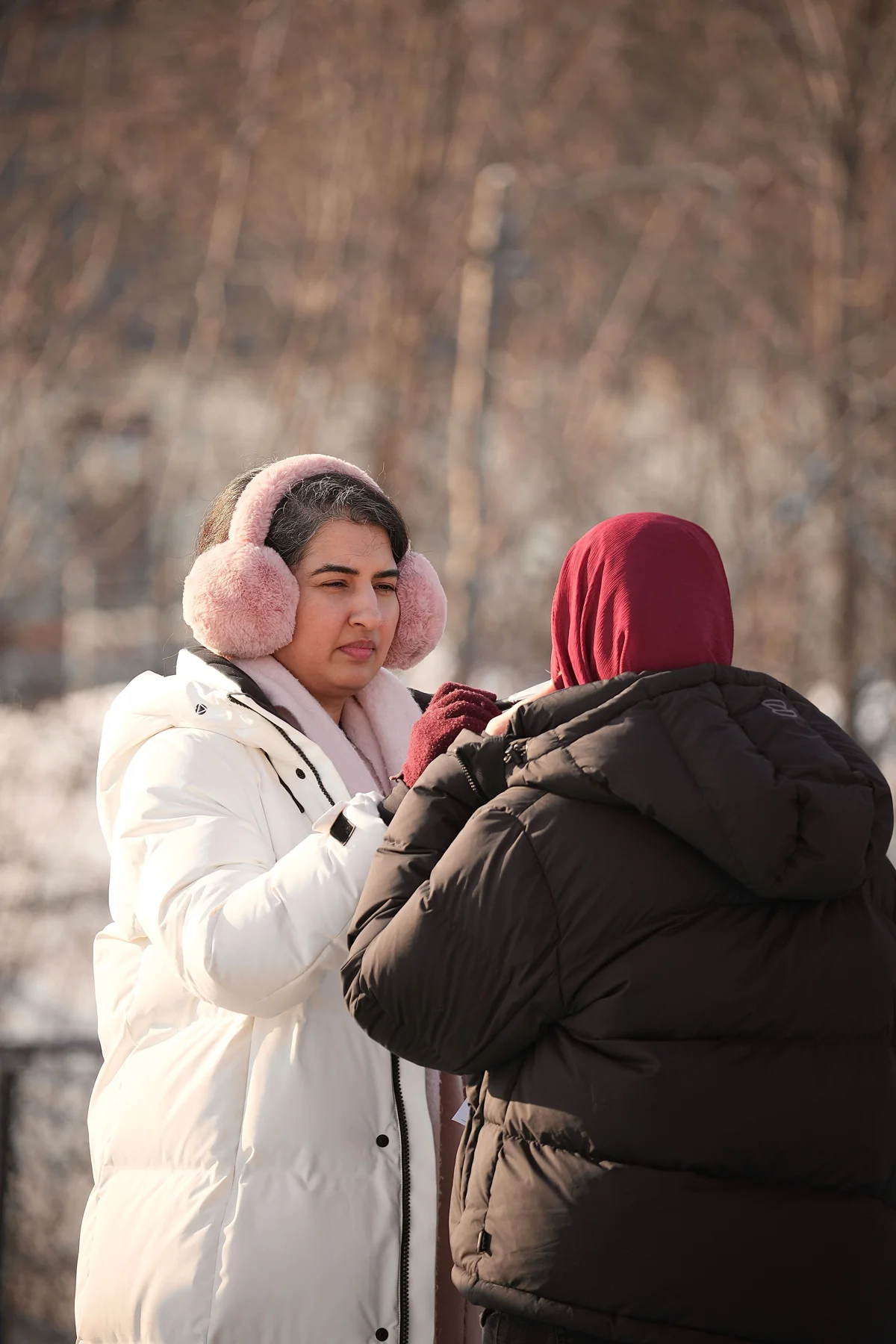 On-set preparation for a performer during the exterior shoot of The Missing Dates.
